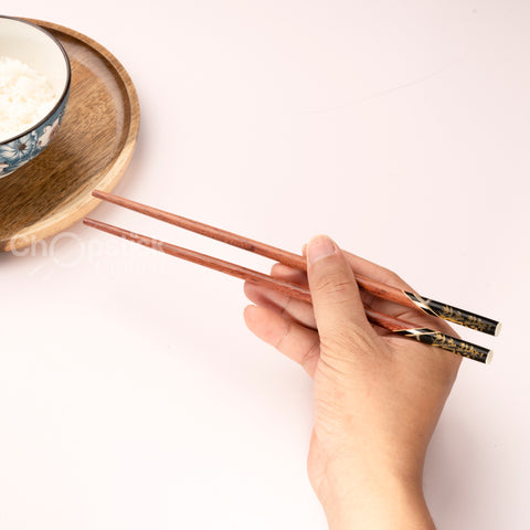 Rosewood chopsticks and leather bag in cherry blossom